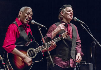 Greg Greenway and Reggie Harris Performing on Stage